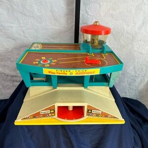 Fisher-Price Teal, Red and Yellow Play Family Airport